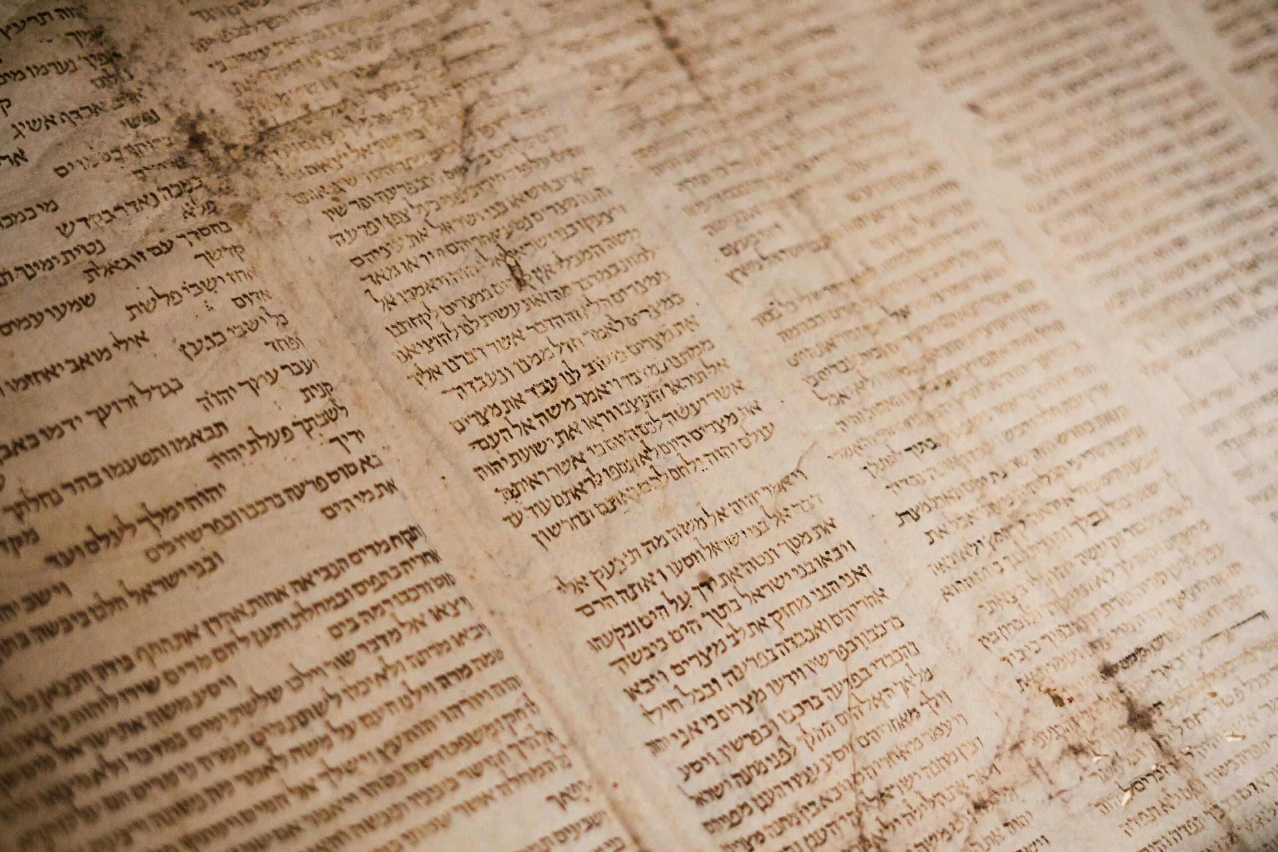 Ancient Hebrew text written on weathered parchment